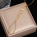 Titanium steel tassel rhinestone finger chain bracelet in drop shape, gold or silver colour options