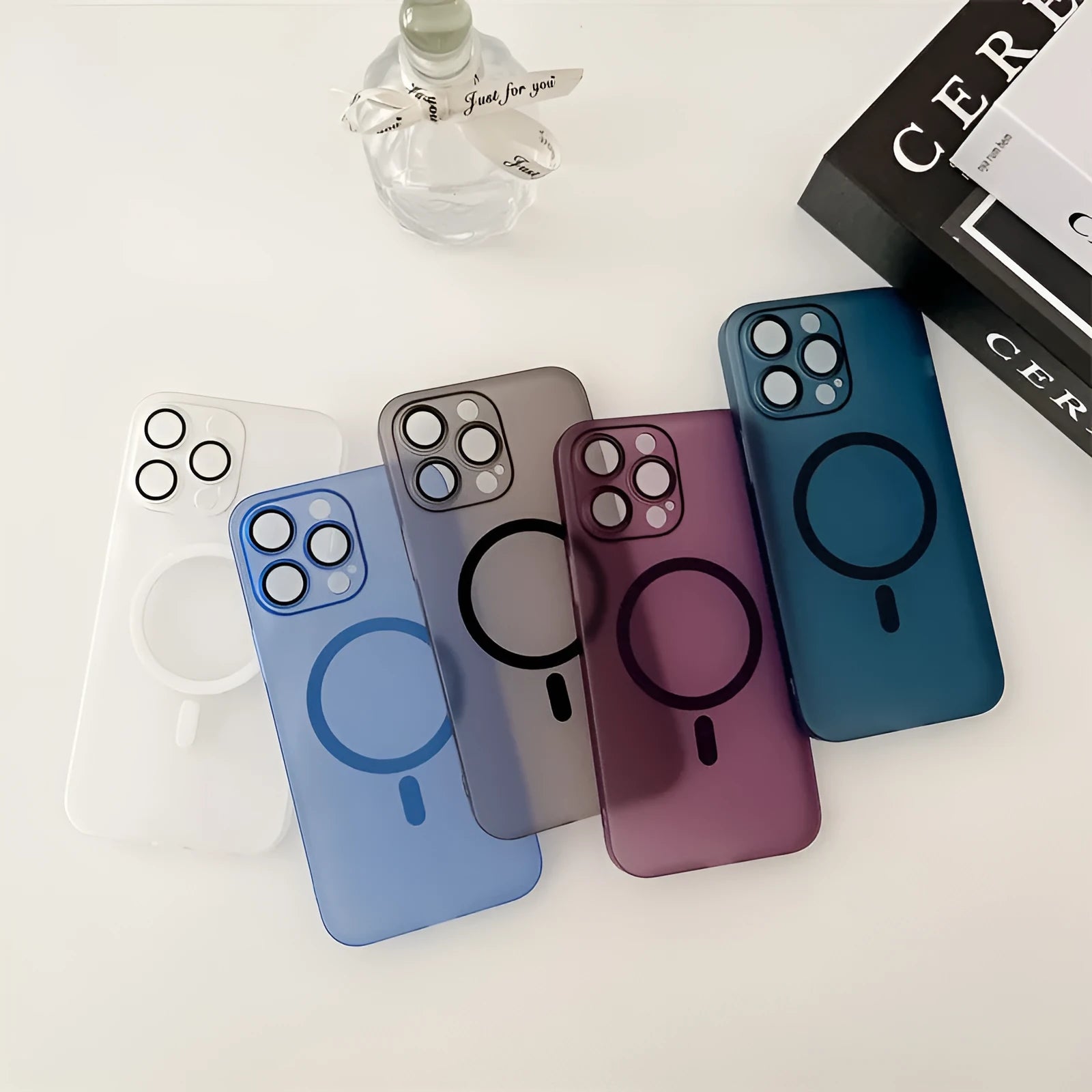 Ice Mist coloured frosted magnetic all-inclusive case for iPhone on a MagSafe charger