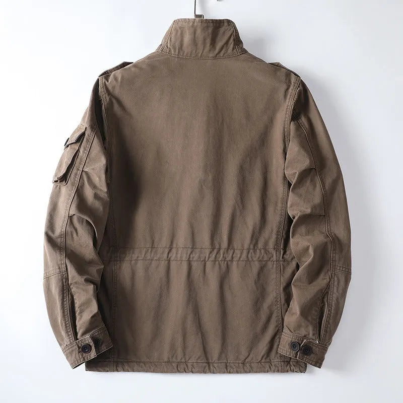Men's loose fit cotton zip-up jacket in light coffee colour, shown on a model.