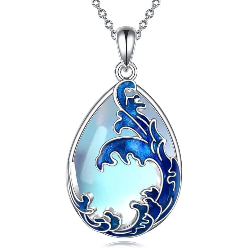 Blue heart-shaped alloy pendant on a necklace chain, love-themed women's jewellery.