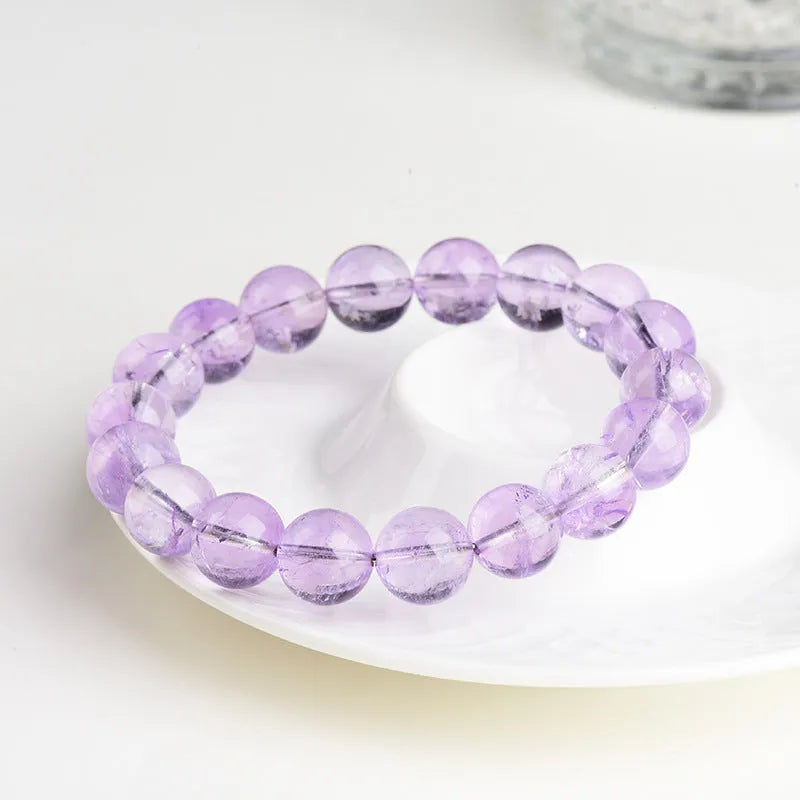 Lavender amethyst geometric bracelet with water ripple design showing nine bead size options from 6-6.8mm to 17-17.8mm diameters