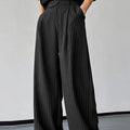 Men's black vertical striped pleated casual trousers showing high elasticity fabric and rabbit hair bamboo fibre blend
