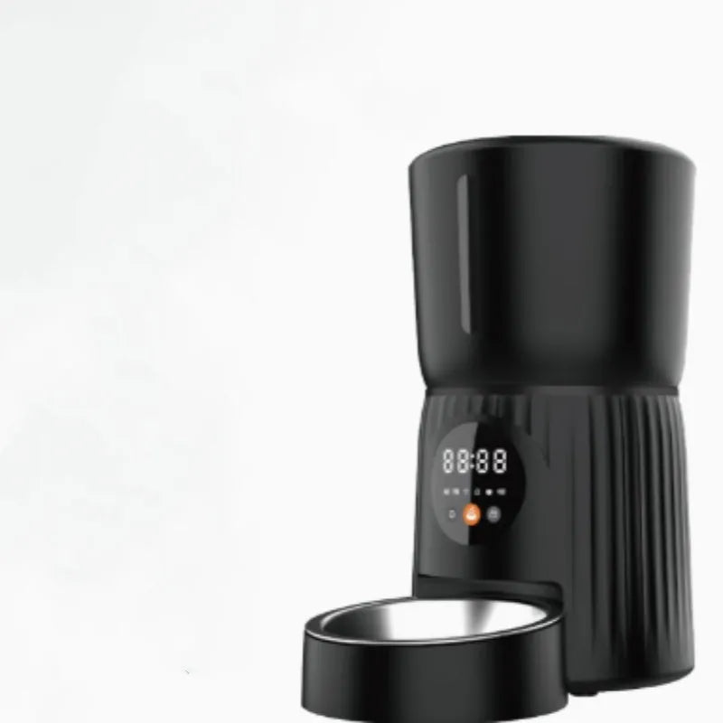 Black intelligent pet feeder with digital display showing feeding schedule, holding dry food