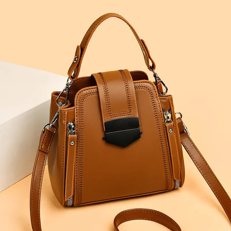 Small square handbag in soft textured PU leather with sewing thread details