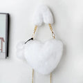 Women's plush heart-shaped handbag with single adjustable strap in various solid colours