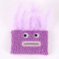 Colourful cat plush toy with a funny big mouth explosion head shape on a plain background.