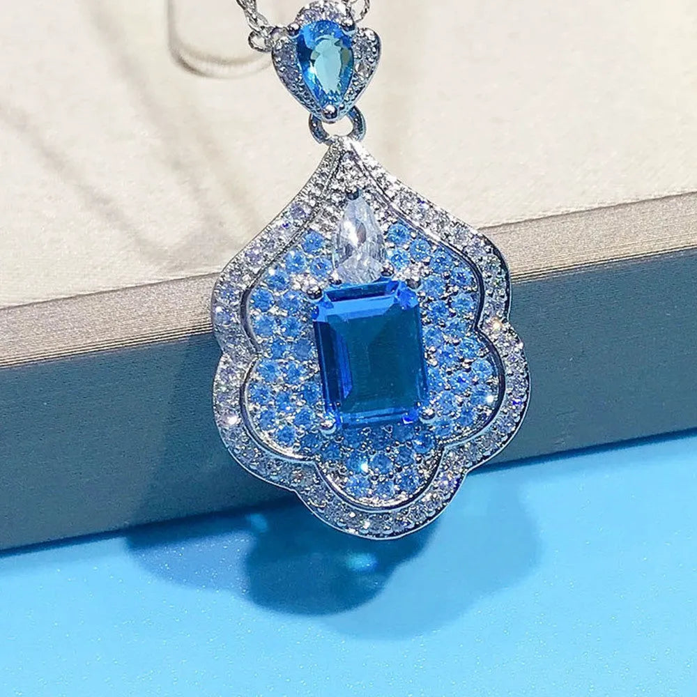 Sea blue geometric copper pendant charm with aquamarine topaz colour for DIY jewellery