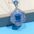 Sea blue geometric copper pendant charm with aquamarine topaz colour for DIY jewellery