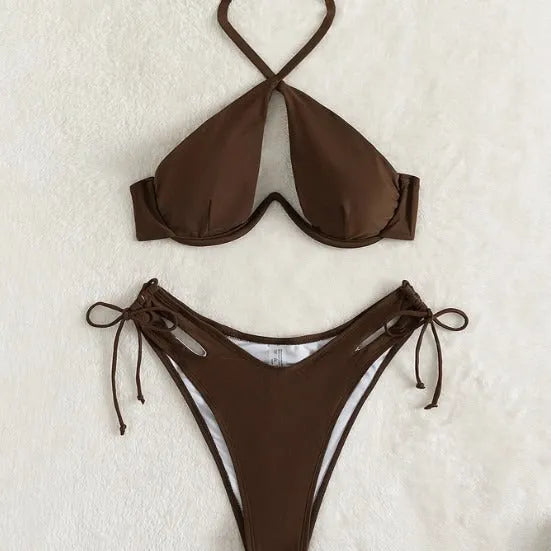 Women's brown halter-neck bikini set with backless top and briefs bottom on a mannequin