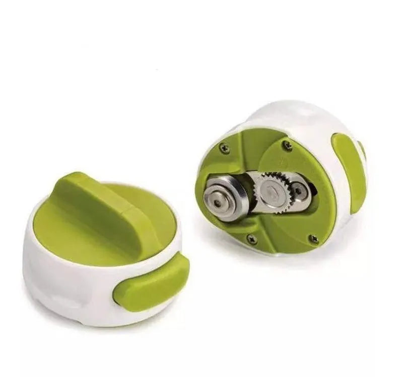 Green and red stainless steel kitchen bottle opener tool on countertop