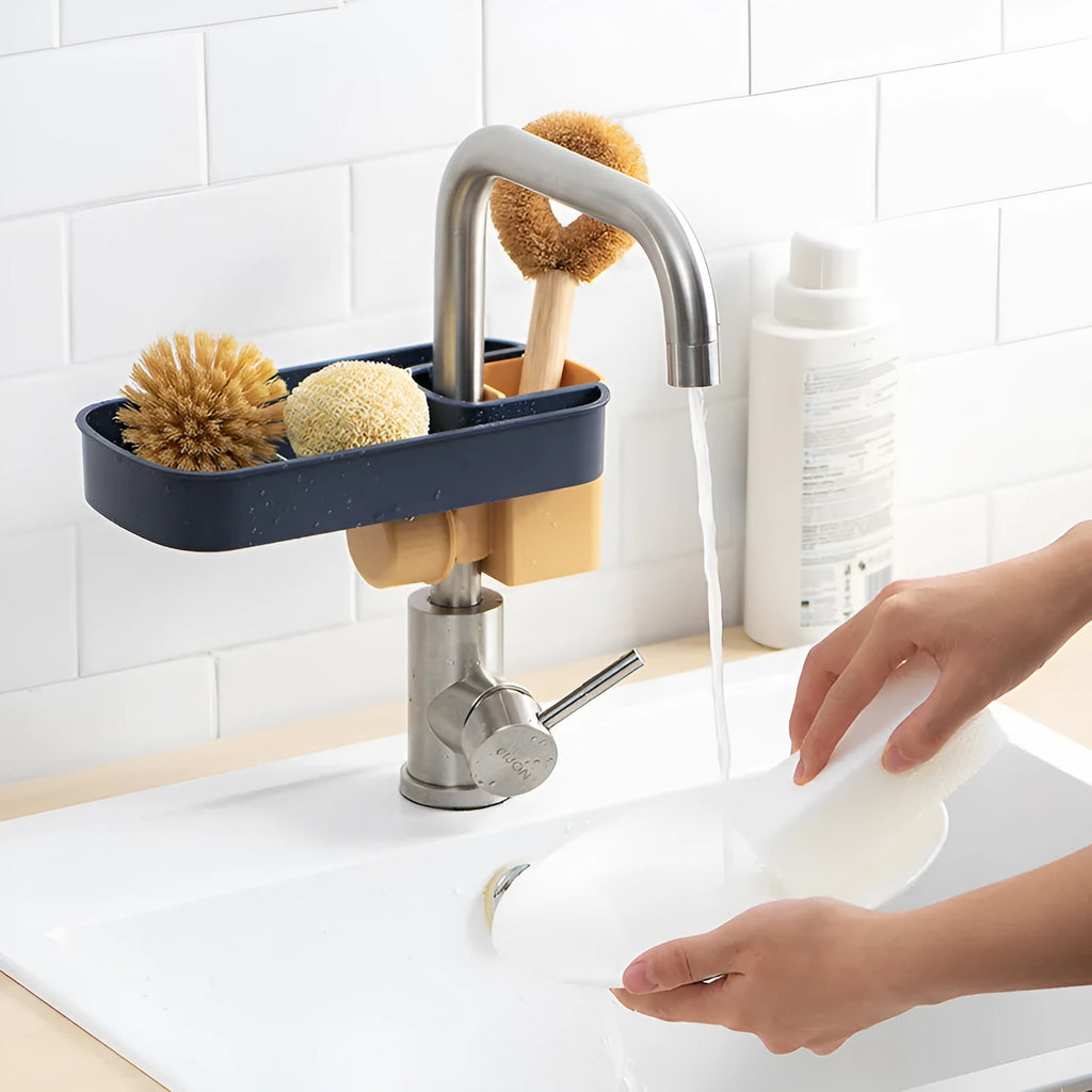 Blue adjustable sink shelf with sponge and brush storage mounted on kitchen faucet
