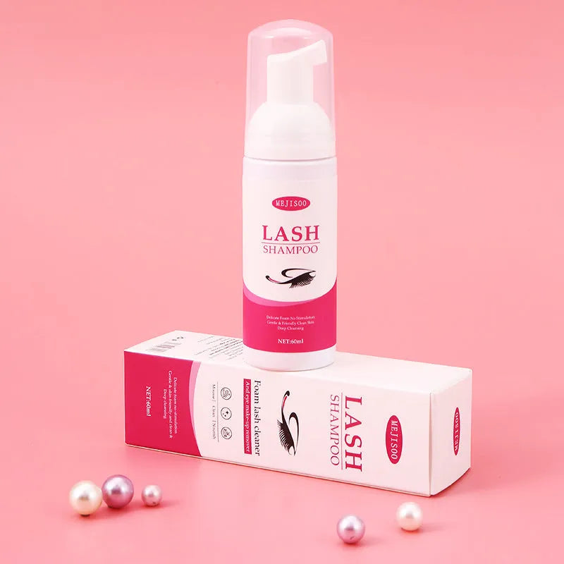 LASH SHAMPOO Mousse Eyelash Cleaning Solution 60ml in 3.7cm by 13.5cm white bottle with blue text