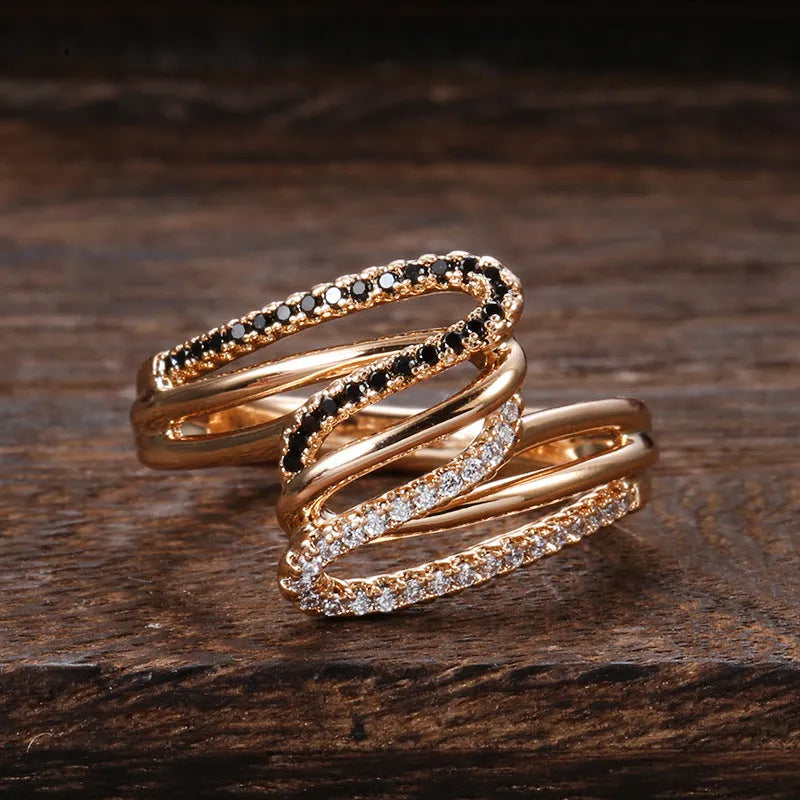 Women's copper ring with micro-inlaid zircon detailing in WK2230 colour on a hand