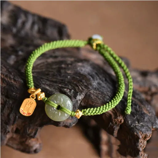 Hand-woven corn knot bracelet with Hetian jade safety buckle on green flexible wire