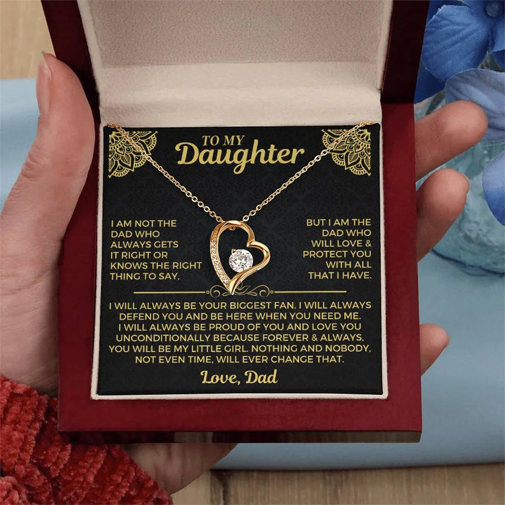 Hollow heart-shaped pendant necklace in silver or gold with gift box and card.