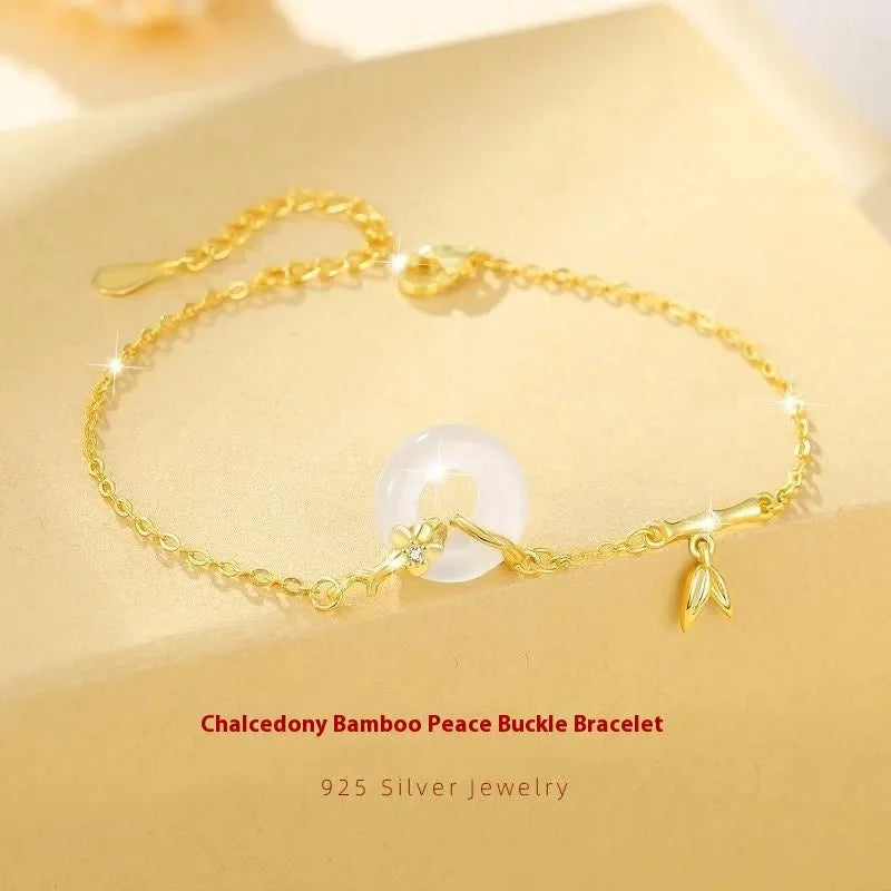 Silver-gold women's bracelet with peace buckle design, white chalcedony stone and starry sky decorations