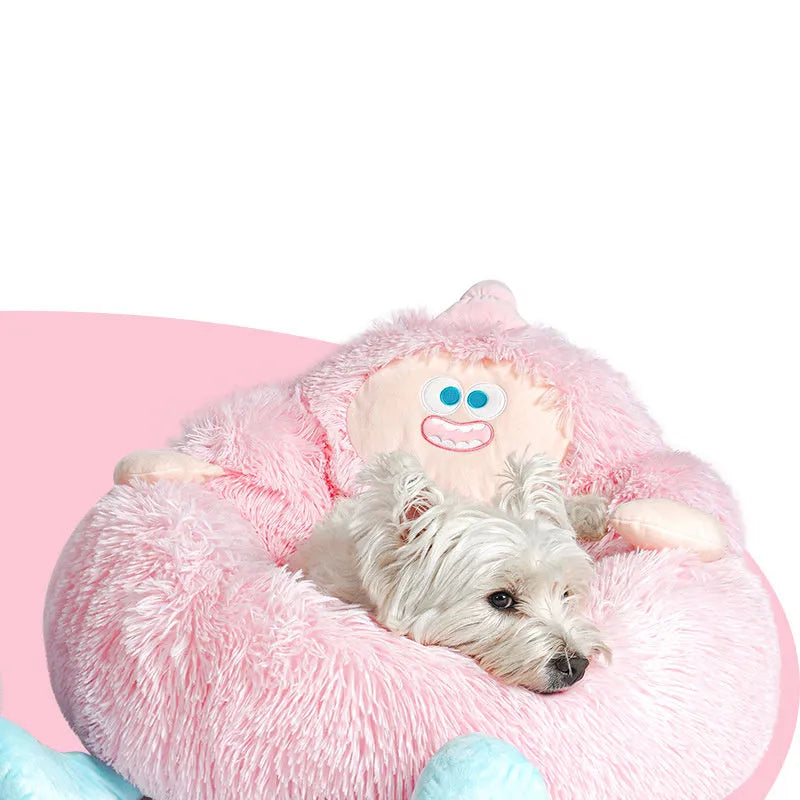 Grey plush circular pet nest bed with high sides for a cat or dog to sleep in.