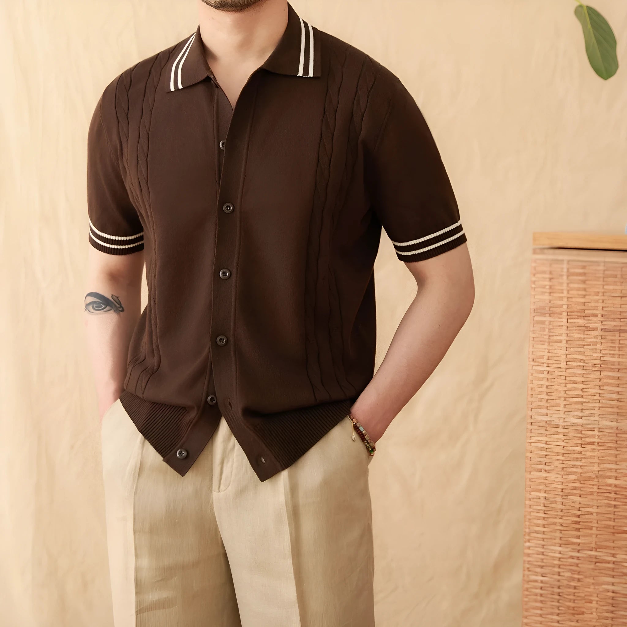 Men's apricot lapel collar short-sleeved cotton blend polo shirt laid flat.