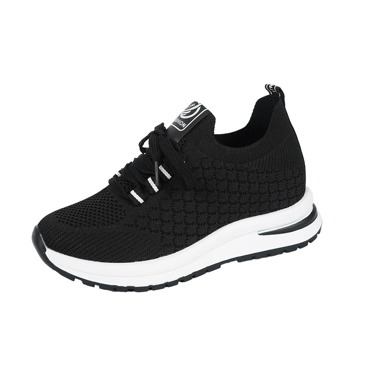 Women's black and white flat lace-up mesh sneakers on a white background