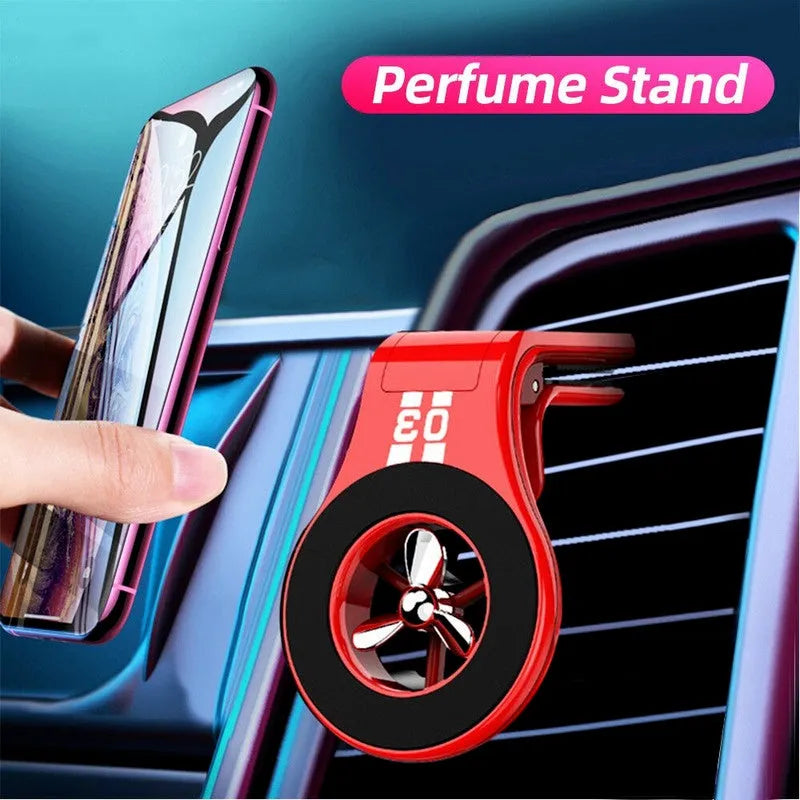 Magnetic car phone holder mounted on air vent with phone attached, showing 360-degree rotation and fragrance slices