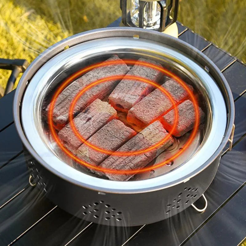 Portable stainless steel BBQ grill with detachable parts and storage bag for outdoor cooking