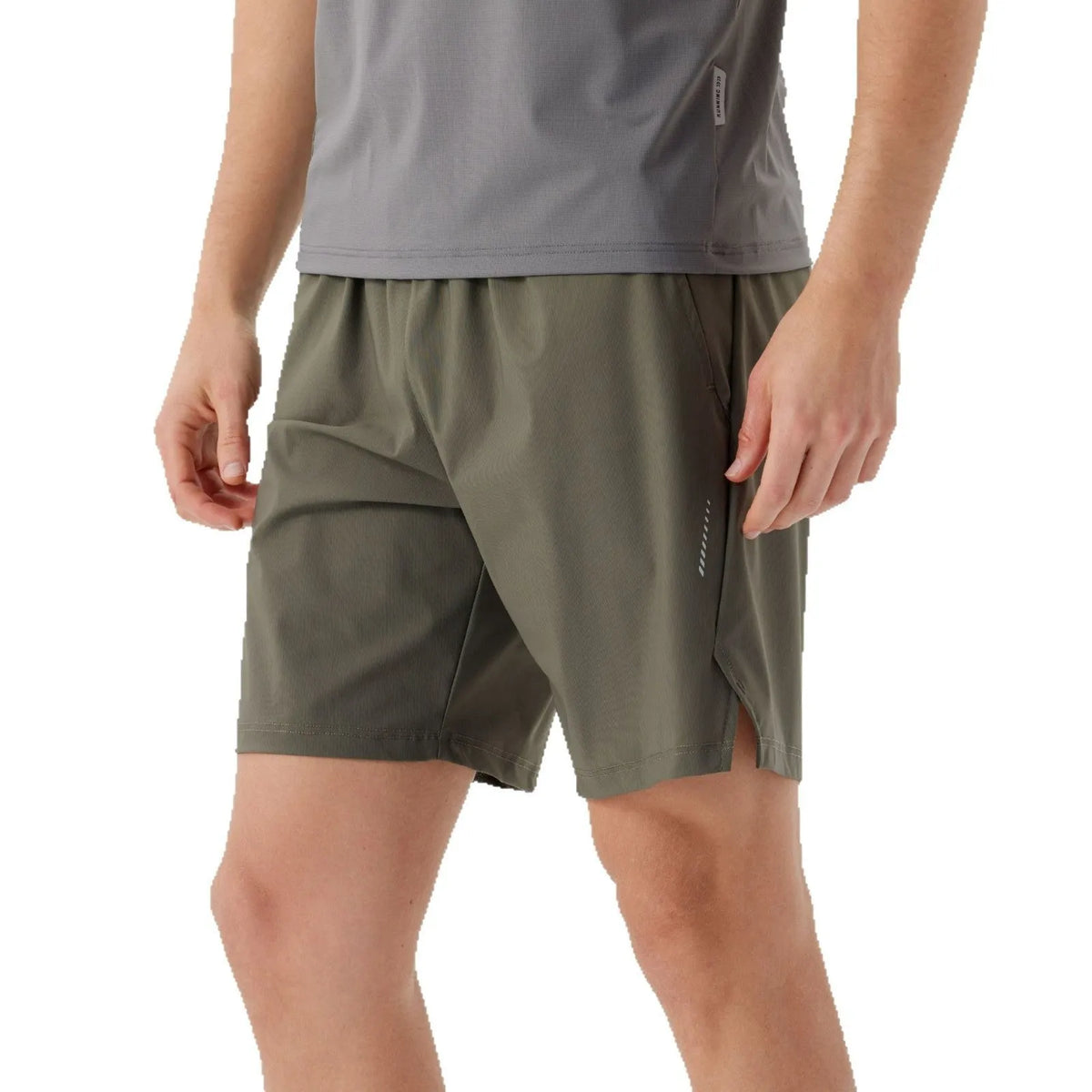 Man wearing black ice silk sports shorts, showing mid-waist fit and shorts length.
