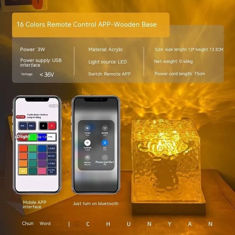 USB rechargeable LED water ripple night light with remote control on a table.