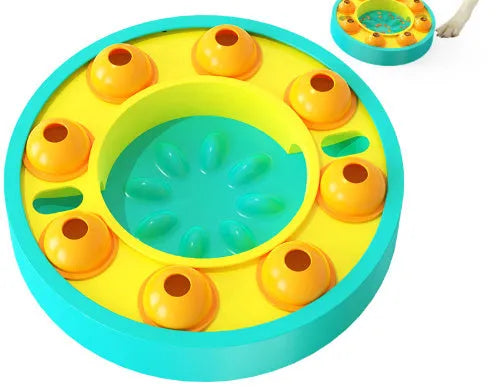 Square green interactive dog puzzle feeder bowl with central column and top turntable on a non-slip base.