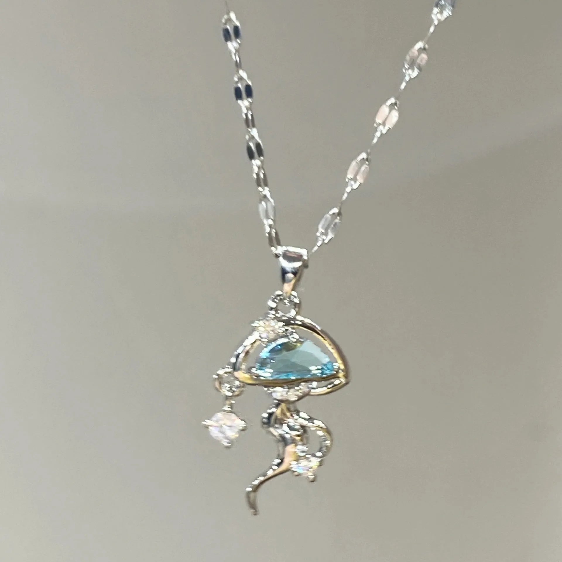 Women's blue jellyfish pendant necklace on adjustable 925 sterling silver chain