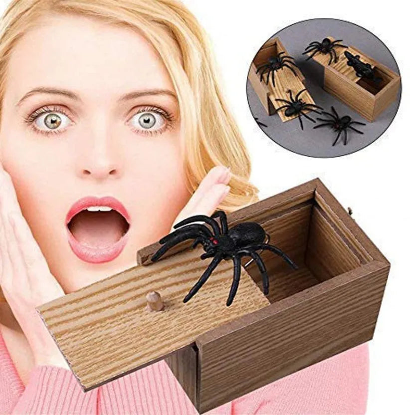 Wooden prank scare box closed, dimensions 9.1cm x 6.1cm x 6.5cm, for April Fools' jokes.