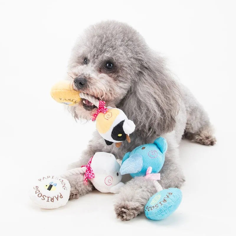 Plush dog toys with animal designs including frog, elephant, cow and bear with cotton rope sections