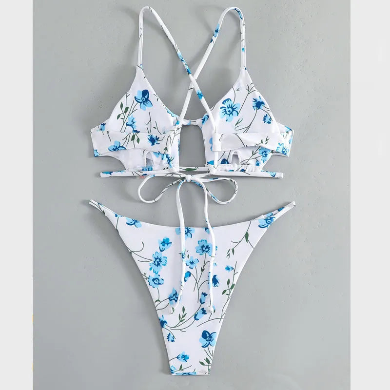 Women's floral patterned tie-neck triangle bikini top with matching shorts swimwear set