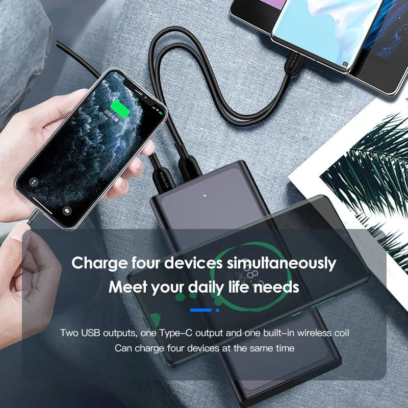 Black and blue alloy-cased portable power bank with wireless charging surface and 10000mAh capacity