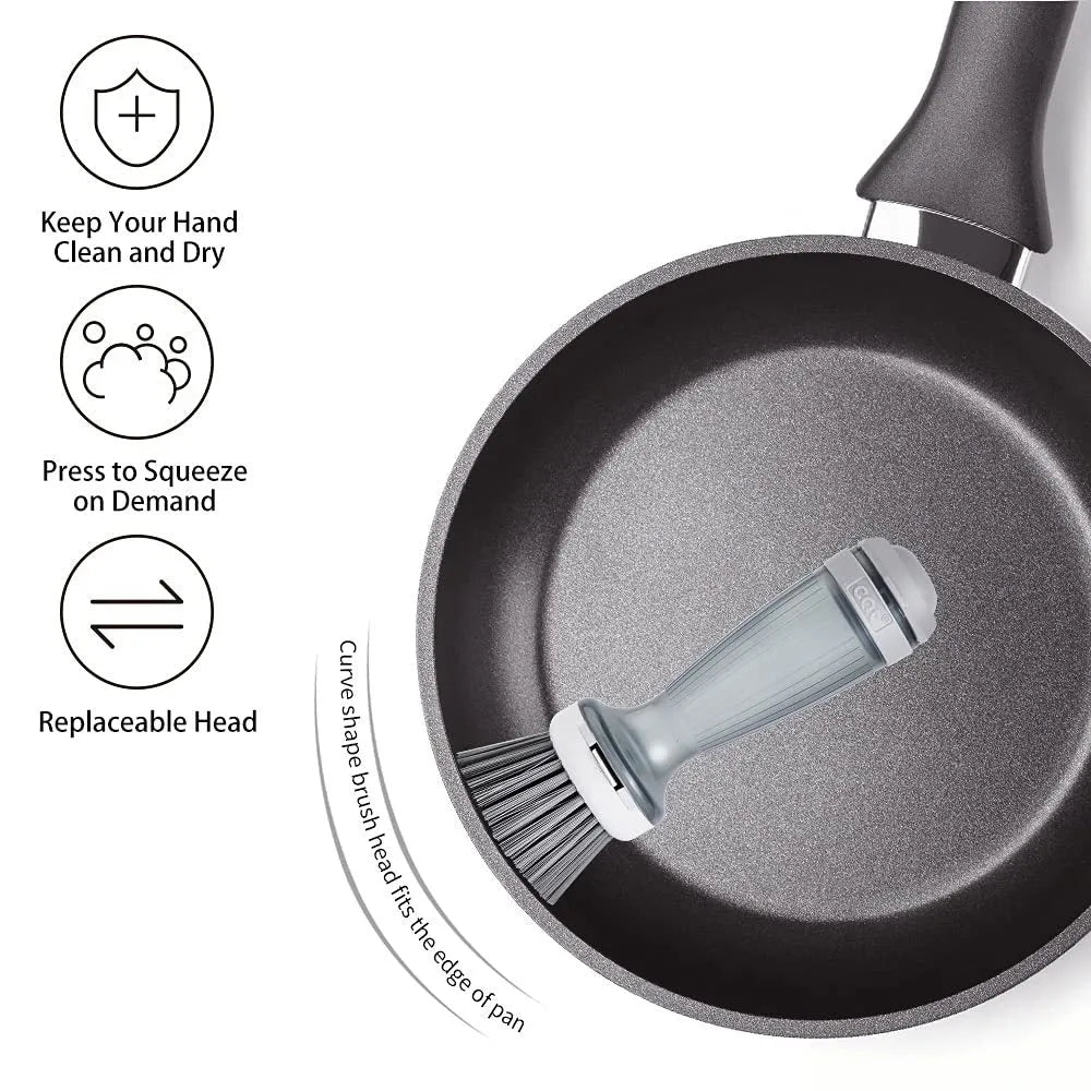 Milk white and mint green kitchen pot brush with soap dispenser in handle and replaceable brush head.