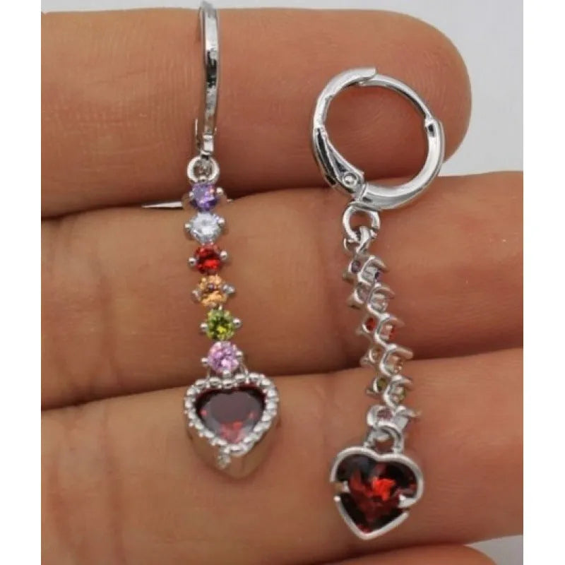 Gold and silver heart-shaped earrings with electroplated finish, showing front and back views
