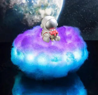 LED astronaut cloud lamp with colour-changing rainbow effect on a wooden stand, 15 x 20cm night light for kids