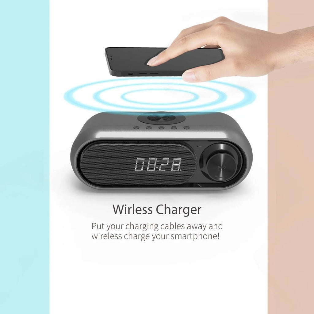 Space grey wireless charging alarm clock with Bluetooth speaker and LED display.