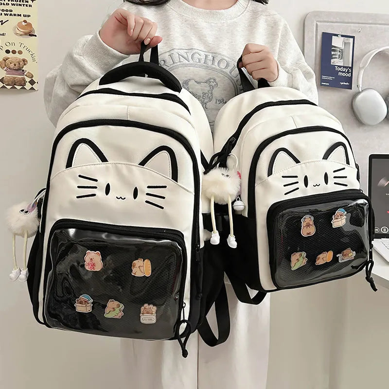 Cartoon design nylon backpack with curved shoulder straps shown in pink colour