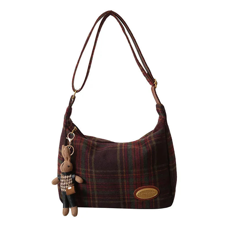 Women's woolen shoulder bag in horizontal square shape with pendant option