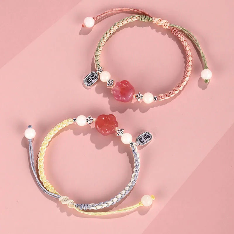 Red cat's paw couple bracelet with woven glass beads in handcrafted pastoral design