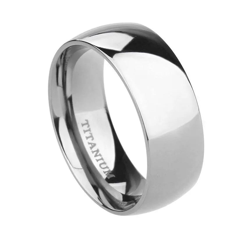 Silver titanium steel ring with grinding finish on finger, showing smooth surface and uniform colour