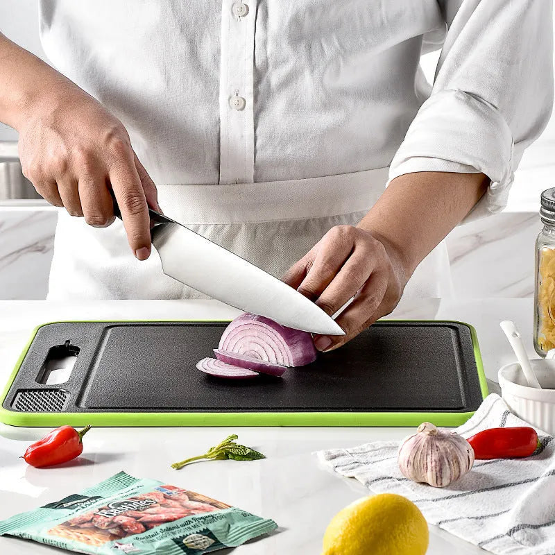 Grey square aluminium cutting board with double sides, grinding teeth, and integrated knife sharpener