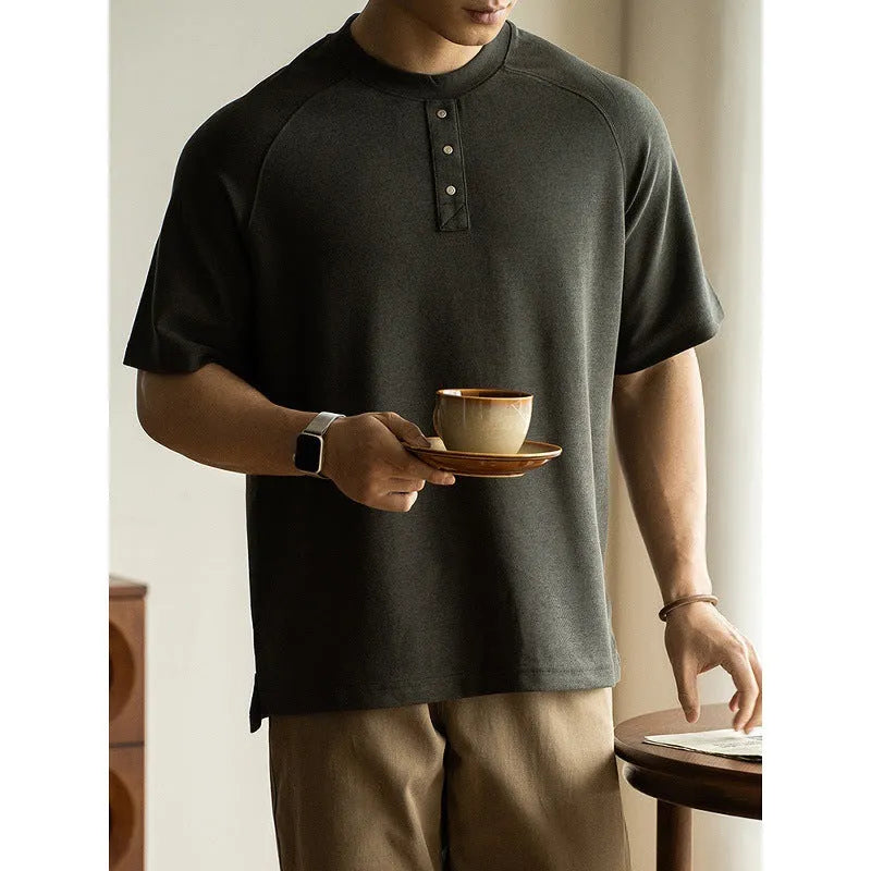 Casual pullover top with raglan sleeves in terry texture fabric showing loose fit and colour options