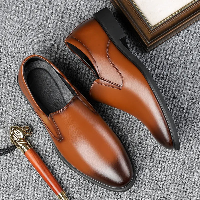 Men's black leather business casual slip-on loafers with leather toe cap and rubber sole