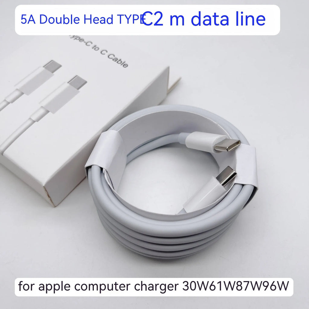 Compact square white laptop USB-C power adapter with optional international plug heads