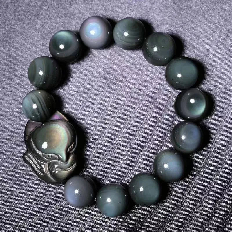 Obsidian fox carved couple bracelet showing animal zodiac design in cartoon style