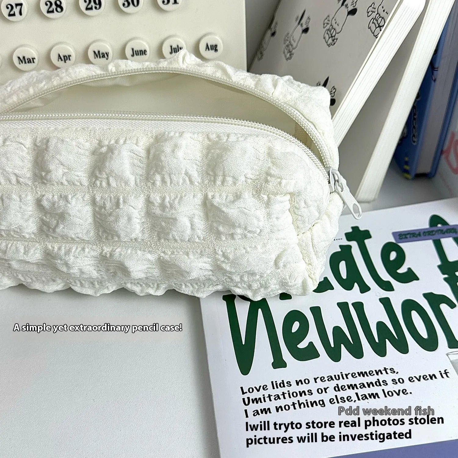 Beige fabric pencil case with soft puffy design and zip closure, measuring 20cm by 8cm