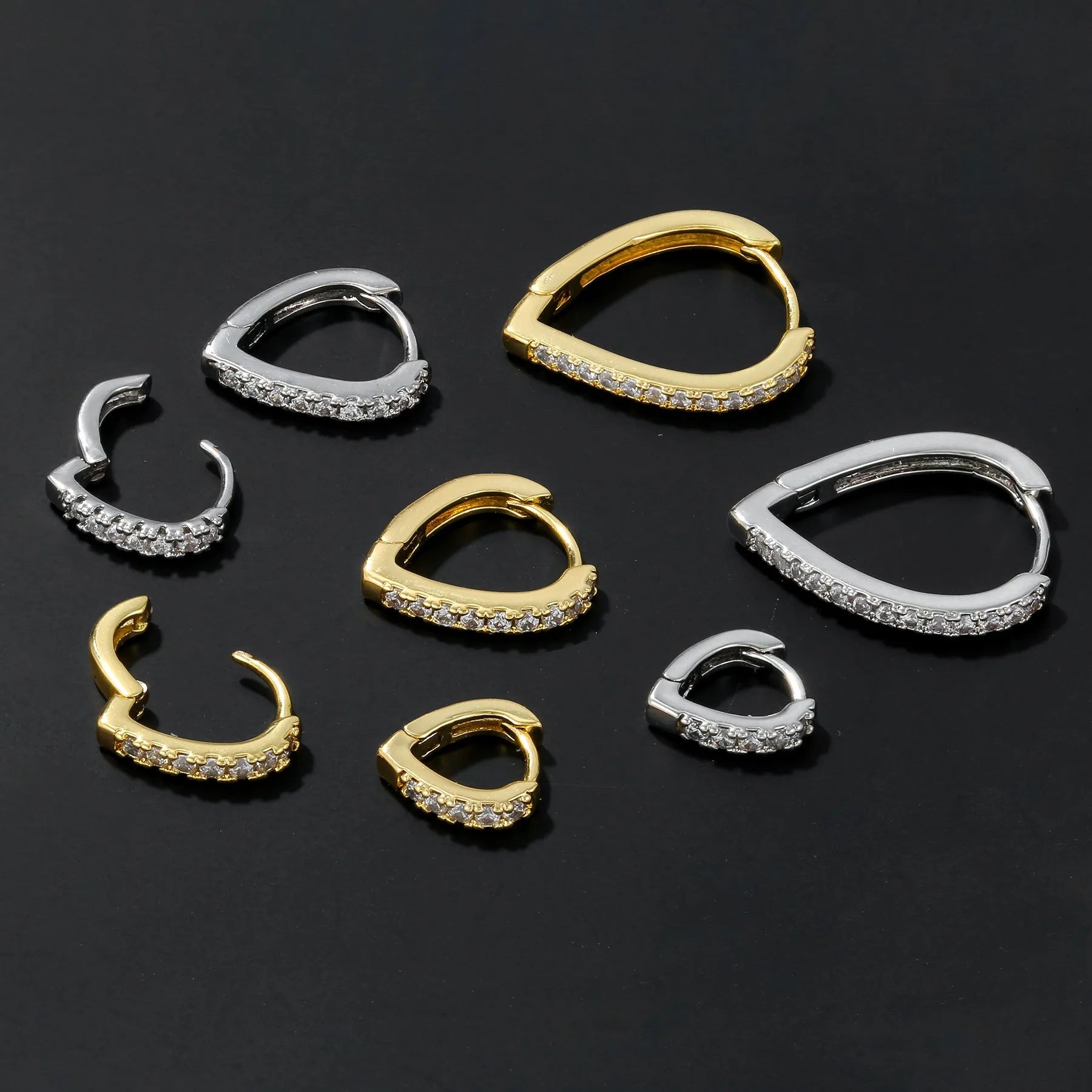Copper geometric heart ear clip with electroplating in gold and white K colours, clip-on design for non-piercing wear