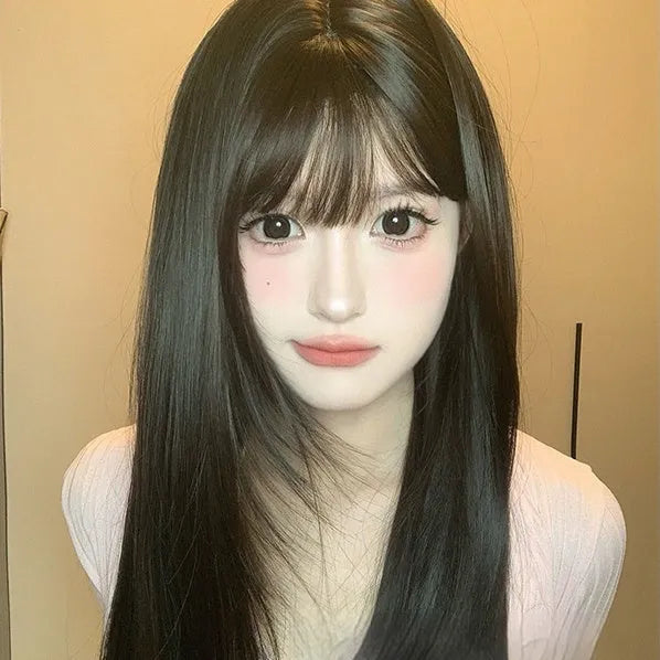 Dark brown women's wig with long straight hair and bangs style on wig head