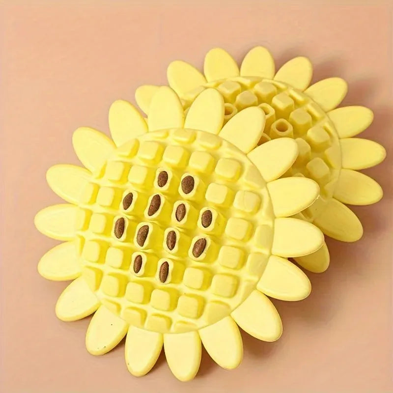 Yellow rubber sunflower-shaped dog chew toy with textured petals.